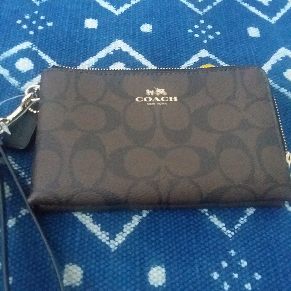 Coach  brown and black wristlet